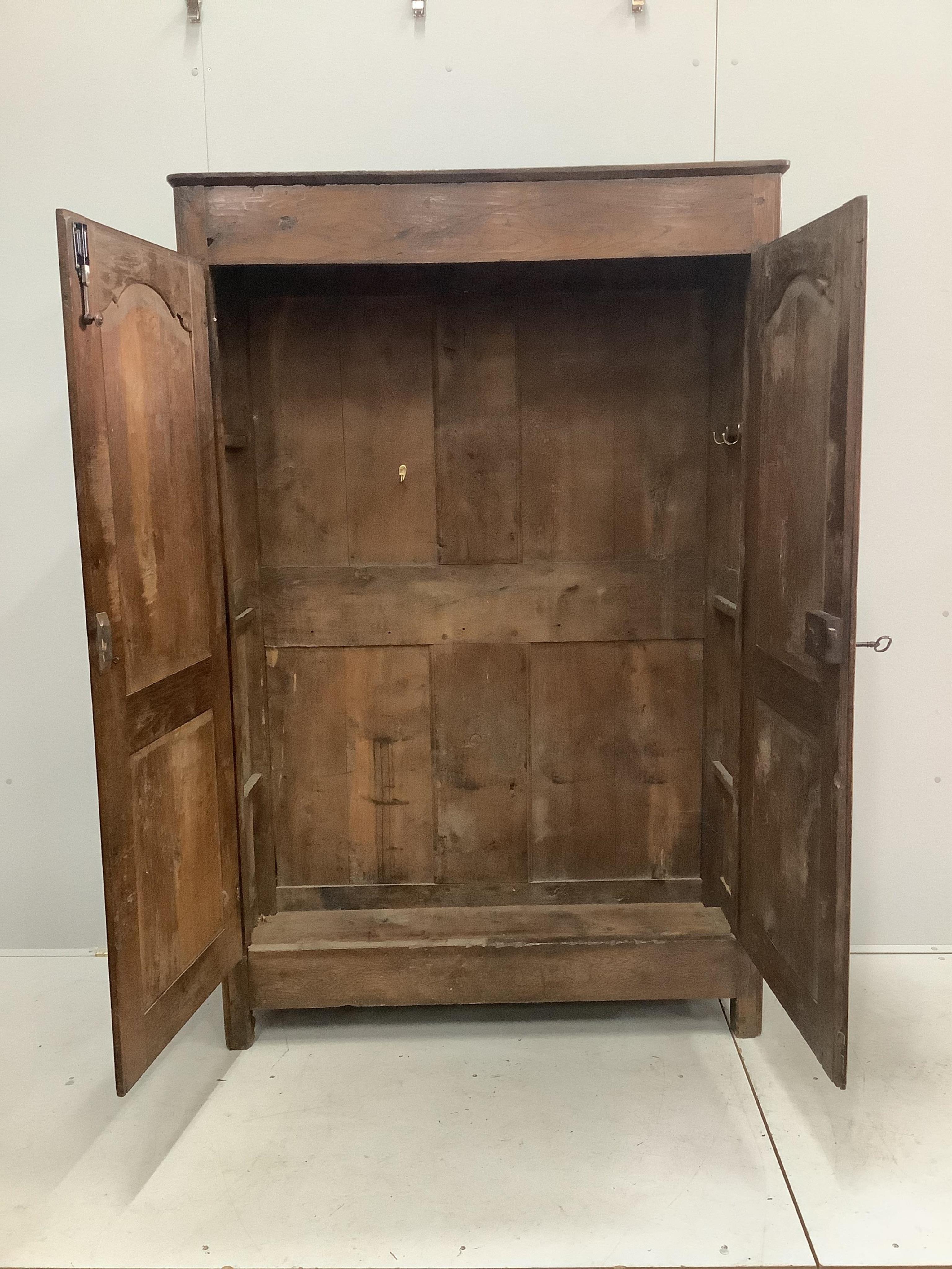 An 18th century Normandy oak armoire, width 122cm, depth 40cm, height 187cm. Condition - fair